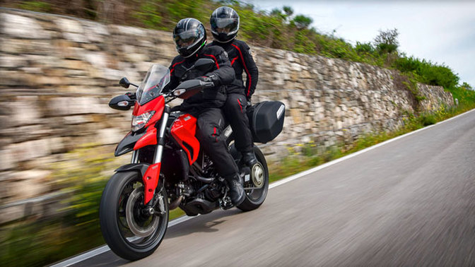 Ducati Hyperstrada Slant Front View With Rider Full Image